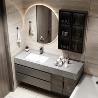 Meuble-lavabo de salle de bain moderne et épuré avec vasque intégrée en pierre thermoformée et lavabo en céramique sans joint