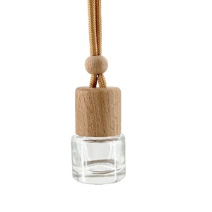 Refillable Cylinder Shape 5ml Round Hanging Perfume <b>Car</b> air Freshener Glass Bottle With Wood Cap - Product Image 1