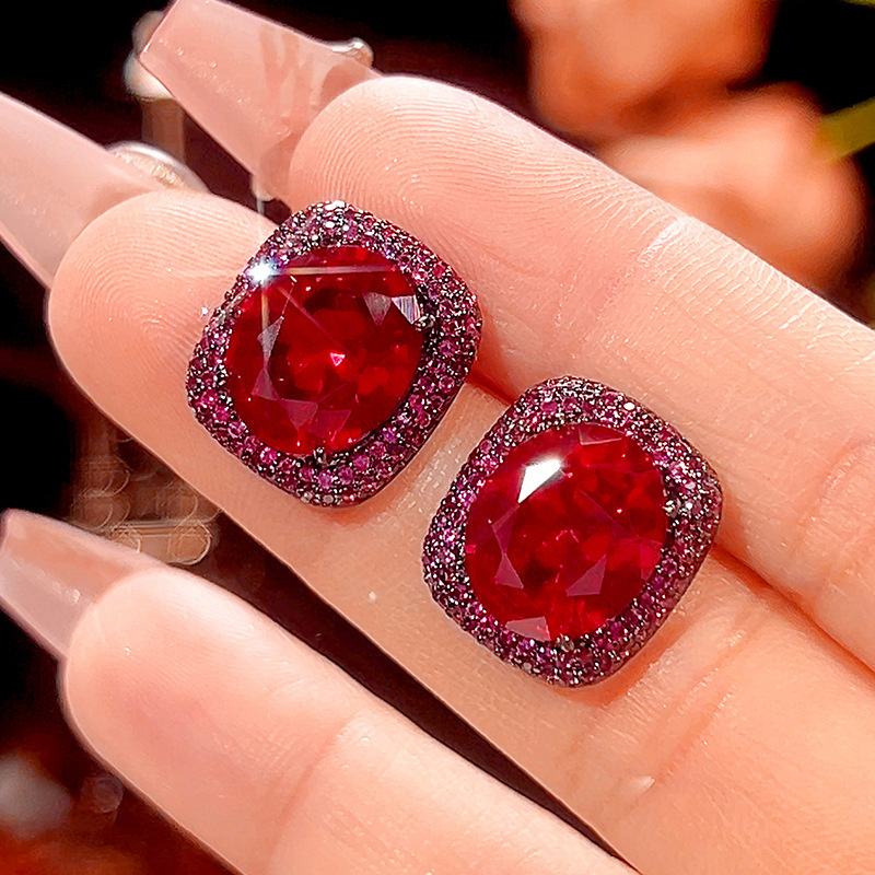 Black Gold red corundum stud earrings