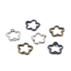 15mm argento fiore <span class=keywords><strong>perline</strong></span> cornici distanziatore <span class=keywords><strong>perline</strong></span> in lega di metallo doppio foro foro cavo fiore connettore collegamento <span class=keywords><strong>telaio</strong></span> <span class=keywords><strong>perline</strong></span> - Product Image 5
