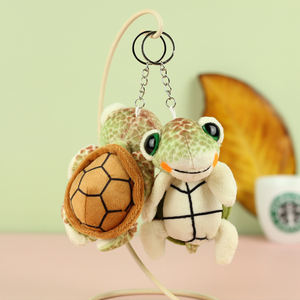 Simpatici giocattoli di <span class=keywords><strong>peluche</strong></span> OEM figurina morbida su misura <span class=keywords><strong>animali</strong></span> di <span class=keywords><strong>peluche</strong></span> <span class=keywords><strong>grandi</strong></span> <span class=keywords><strong>occhi</strong></span> di pelliccia materiale tartaruga ciondolo bambola portachiavi per promozione regalo - Product Image 2