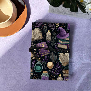 Carnet de notes A6 de bureau fait à la main 160 pages Premium Welfare for Top Employees with Books Candles Witch Hat Potions Pattern on the - Product Image 1