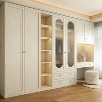 Armoire de chambre moderne avec portes en MDF, coiffeuse et tiroirs, design portable