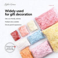 Papier déchiqueté ondulé multicolore biodégradable en pâte chimique pour emballage cadeau et fournitures de décoration en gros