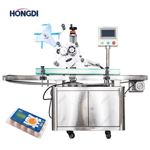 Machine d'étiquetage automatique haute efficacité pour bouteilles plates, boîtes et conteneurs - Product Image 2
