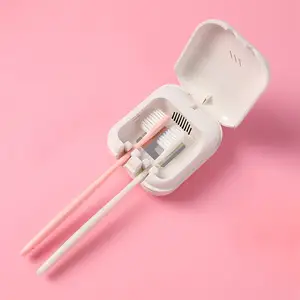 New Trending UVC Smart Sterilization Automatic 2 Holder Toothbrush Sterilizer With Heating Drying Fan For Electric Toothbrush