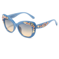 Lunettes de soleil œil-de-chat vintage en plastique floral dégradé unisexe avec protection UV400 – Confortables et tendance pour femme