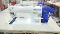 Machine à coudre industrielle Jukis DDL-7000A-7 d'occasion Sets complets avec table et support