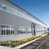 Construcción industrial Almacén Almacenamiento de acero Armaduras de techo Puertas correderas de aluminio Estructura prefabricada Edificios prefabricados