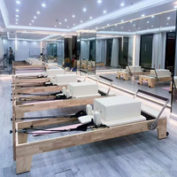 Mejor máquina de Pilates Reformer profesional multifuncional de madera, equipo de entrenamiento de núcleo telescópico de alta resistencia con resortes alemanes