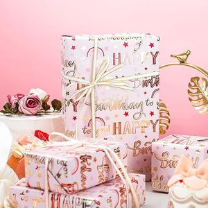 Original pink aluminum-coated <b>paper</b> <b>packaging</b> with gold foil pattern of the letters Happy Birthday and star shapes - Product Image 1