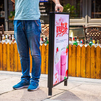 Panneau publicitaire pliable d'extérieur résistant au vent en fer, support de porte en A, panneau d'affichage vertical sur pied