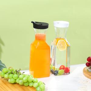 Bouteille de jus en PET biodégradable de 1500ml 50oz, pot à lait rond carré en <span class=keywords><strong>plastique</strong></span> avec bouchon à rabat, <span class=keywords><strong>carafe</strong></span> à boissons transparente - Product Image 4