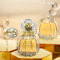 Flacon de parfum rond en verre transparent vide de 50 ml personnalisé avec logo et emballage