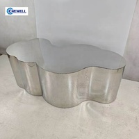 Table basse en acier inoxydable de luxe moderne de forme unique, sur mesure, haut de gamme, pour salon