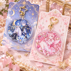Llavero de acrílico de anime con diseño de muñeca redonda, colgante de mosquetón ligero con incrustaciones, patrón de estrellas y lunas en rosa y azul - Product Image 2