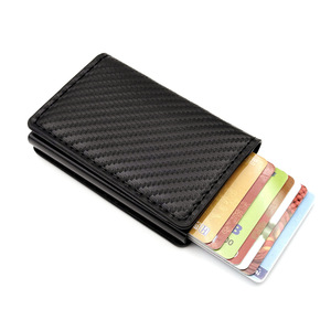 Tarjetero de fibra de carbono con múltiples ranuras para tarjetas, extracción automática, billetera metálica con protección RFID antirrobo para hombres y mujeres, uso diario. - Product Image 1