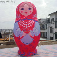 Vente en gros de poupée gonflable en porcelaine matriochka, modèle de conception pop-up pour les fêtes de vacances en plein air, accessoire de souffleur d'air