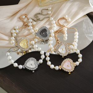 Montre élégante et tendance de style scolaire ovale de luxe pour étudiants unisexes, avec un cœur serti de diamants, une boucle à tirette en perle - Product Image 1