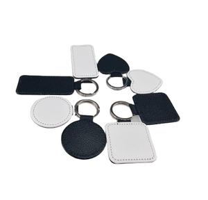 Impermeabile in pelle epossidica RFID portachiavi Mini PU con Chip T5577 per il controllo accessi 13.56MHz <span class=keywords><strong>NFC</strong></span> e QR Code Interface - Product Image 1