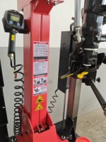 Démonte-pneus automatique sans levier Runche TC-53 avec pince centrale, pour pneus jusqu'à 28 pouces, diamètre de roue max. 1040 mm, force de démontage de la goupille 2800 kg