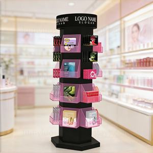 ชั้นวางสินค้าดูแลผิวแบบโลหะหลายด้าน พร้อมตะขอและตะกร้าอะคริลิกใสสำหรับแผ่นมาส์กและผลิตภัณฑ์ - Product Image 1