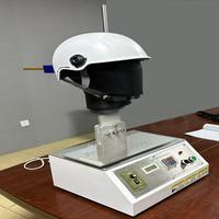 Testeur de résistance aux solvants et à la friction pour casques EN 397