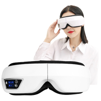 Masque de massage oculaire chauffant en graphène double couche 2025 avec vibration pour un sommeil relaxant et un confort oculaire optimal