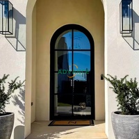 Porte d'entrée double arquée en fer forgé et verre, style commercial 2025, pour patio extérieur en acier