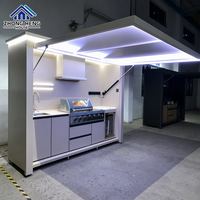 Cuisine mobile d'extérieur de luxe en acier inoxydable 304, pliable, avec auvent à levage hydraulique, LED, grill, évier, réfrigérateur et crédence modulaire