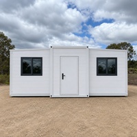 Maison pliable extensible en panneaux blancs, conteneur portable pour le glamping en extérieur, le bureau ou l'hébergement temporaire