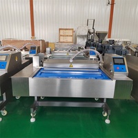Machine d'emballage sous vide continue de laminage sous vide d'aliments de forme physique de biscuits compressés