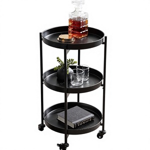 Chariot roulant rond à 3 niveaux en métal noir avec roulettes, chariot de service minimaliste pour la maison - Product Image 1