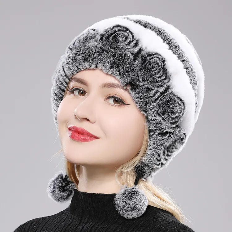 新しいスタイルのカスタム厚手の暖かいイヤーフラップ冬の帽子ポンポンファッションニット女性の帽子冬のキャップ