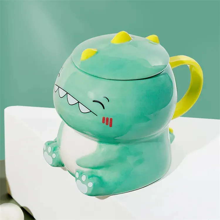 Tazza da caffè in ceramica per bambini con dinosauro 3D carino di forma unica all'ingrosso con coperchio e cucchiaio