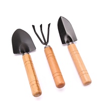 Facile da usare piccolo Mini attrezzi da giardinaggio in metallo pala per terreno Set di rastrelli per vanga manici in legno