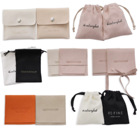 Organisateur de bijoux en mini rouleau de voyage en microfibre de luxe avec logo personnalisé emballage cadeau pochette à bijoux pour boucles d'oreilles bagues collier