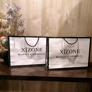 Premium White Kraft <b>Paper</b> Shopping Bags with Custom Printing Strong Rope Handles for Boutique Retail Packaging - Product Image 1