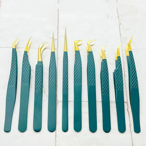 Pince à épiler en acier inoxydable <span class=keywords><strong>de</strong></span> haute précision pour extensions <span class=keywords><strong>de</strong></span> <span class=keywords><strong>cils</strong></span>, série Plume dorée, dauphin et fleur - Product Image 1