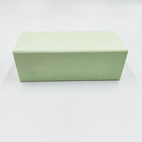 Boîte d'emballage compacte en papier cuir vert entièrement dépliée, frais de port ultra-reduits