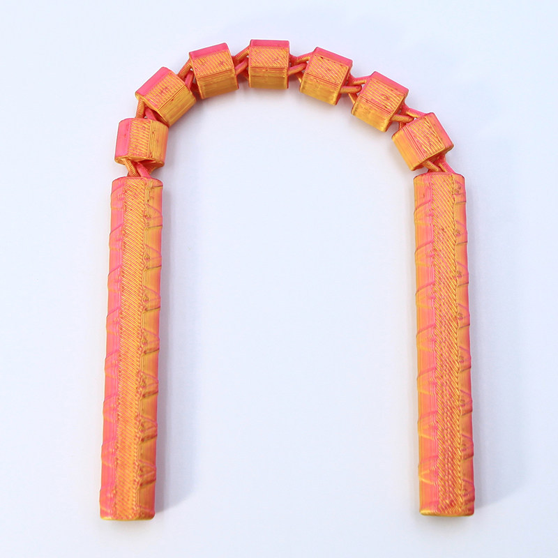 Nunchaku en or rouge 28 cm