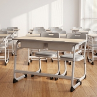 Meubles et équipements scolaires populaires : Ensemble bureau et chaise double réglables pour élèves, idéal pour les salles de classe primaires