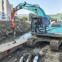 Marteau vibrant hydraulique monté sur excavatrice KN200 pour le battage de pieux tubulaires et de pieux-plaques