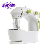 Mini machine à coudre électrique pour usage domestique, idéale pour la couture à domicile ou en atelier.