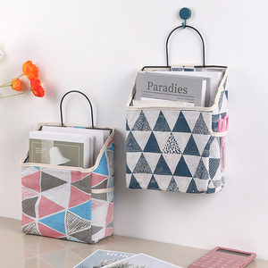 Bolsa de almacenamiento de tela para colgar en la pared, organizador de múltiples bolsillos, material de algodón, sin perforaciones, para uso en oficina, dormitorio y baño - Product Image 1