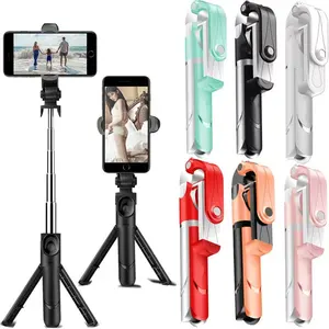 Precios baratos alta calidad XT09 extensible Selfie Stick trípode con control remoto inalámbrico y trípode soporte para teléfono móvil