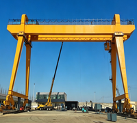 Grue portique à double poutre modèle MG montée sur rail avec palan électrique à câble métallique