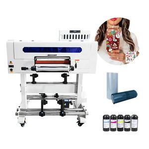 Imprimante DTF UV A2 420 mm <span class=keywords><strong>avec</strong></span> trois têtes d'impression, automatique rouleau-à-rouleau <span class=keywords><strong>avec</strong></span> laminateur 2-en-1 pour l'impression d'autocollants, de verre et de coques de téléphone - Product Image 1