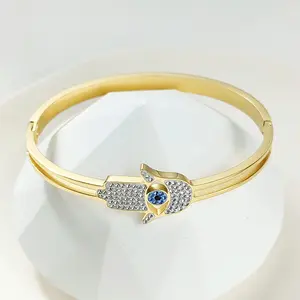 Joyería de moda personalizada Brazalete de acero inoxidable chapado en oro de 18 quilates Mano de Fátima Pulsera de Ojo Azul