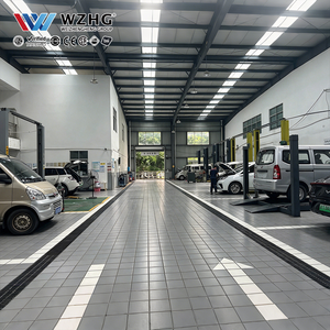 Instalación Automotriz Eléctrica Metálica Personalizada con Oficinas con Fachada de Vidrio de Marca y Espacio de Entrega de Vehículos para Redes de Servicio - Product Image 1